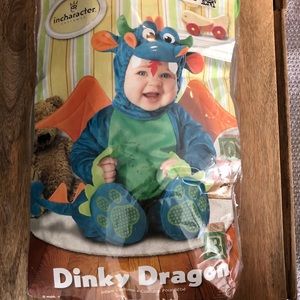 New, never worn. Dinky dragon costume size 12-18M